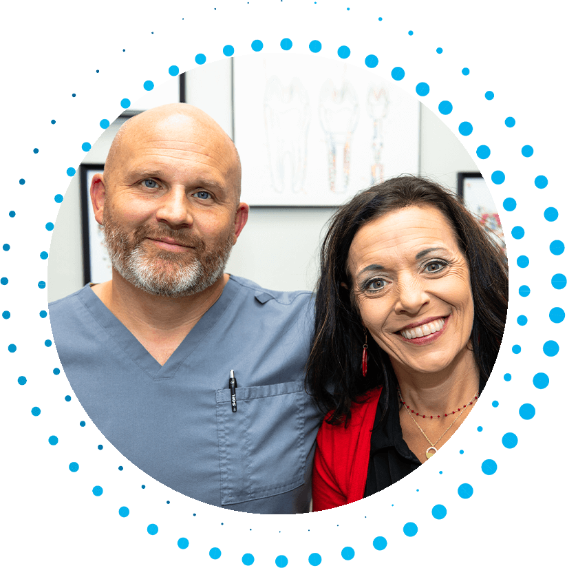 dental patient smiling with Dr. Carey