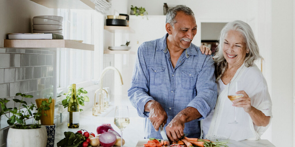 senior couple preparing a meal